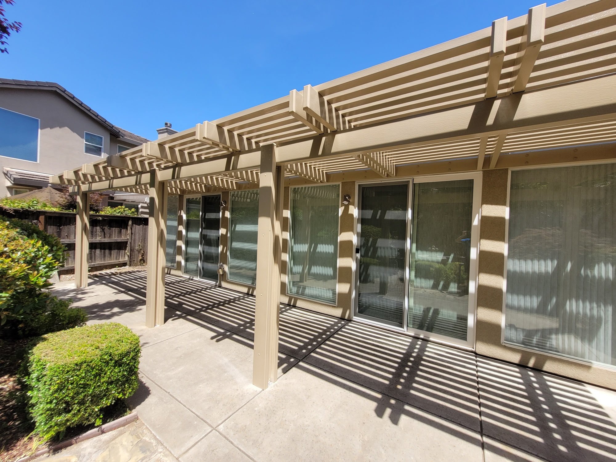 Custom aluminum lattice patio cover installed by West Coast Awnings in Sacramento, CA